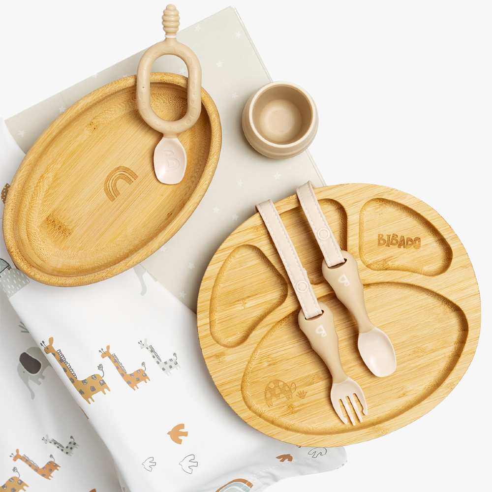 A baby's bamboo plate and cutlery set 