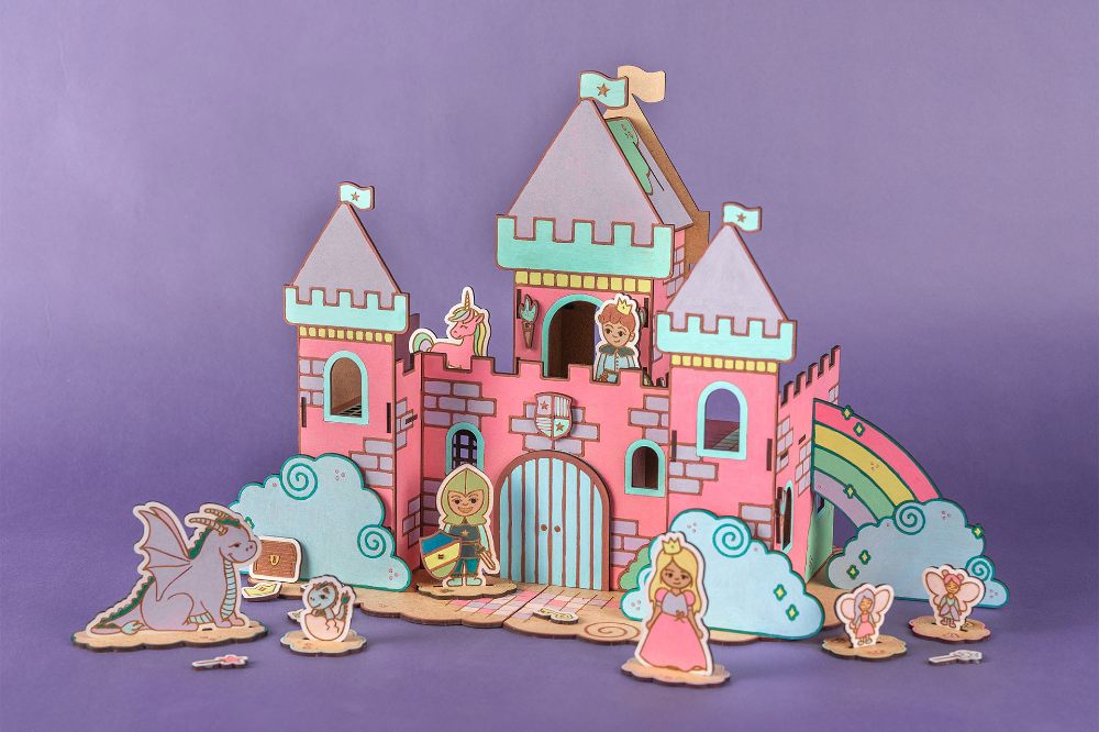 A child's toy castle against a purple background