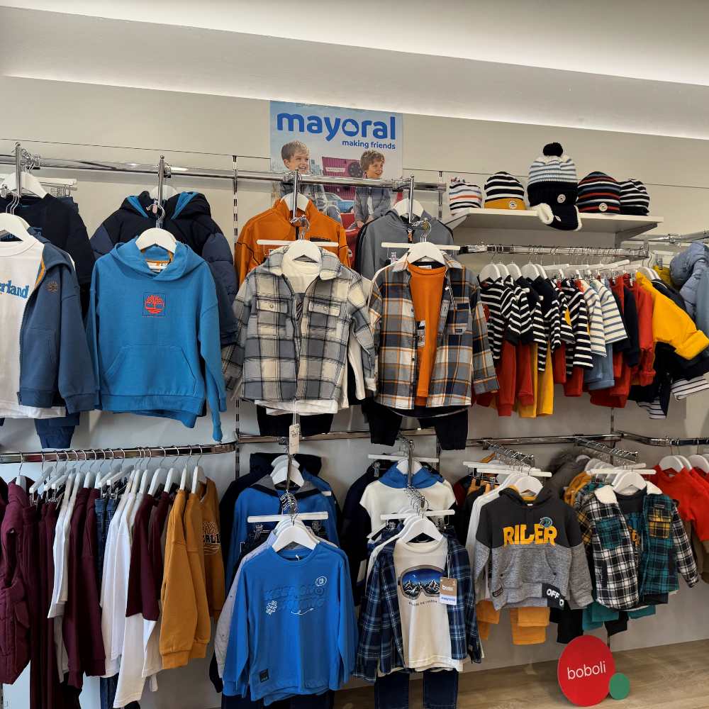 Boys' clothes displayed on a wall in the Lavender's Blue store 