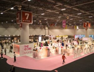 People stood in an exhibition hall at IFCO Istanbul Fashion Connection