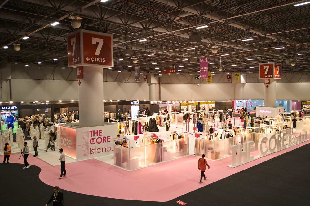 People stood in an exhibition hall at IFCO Istanbul Fashion Connection