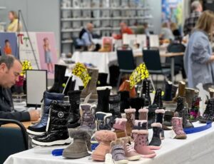 Stands of children's shoes at INDX National Kids Footwear Show