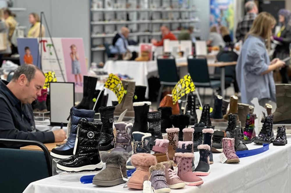 Stands of children's shoes at INDX National Kids Footwear Show