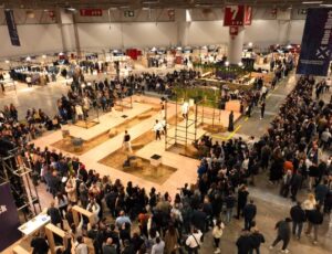 A shot of a hall full of people at the Texhibition trade fair