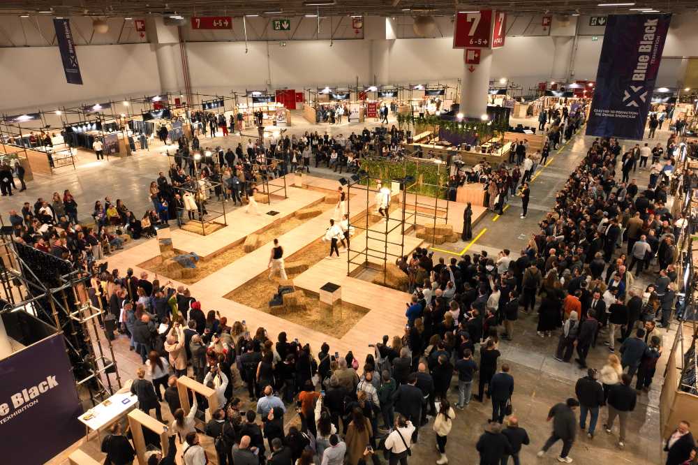 A shot of a hall full of people at the Texhibition trade fair