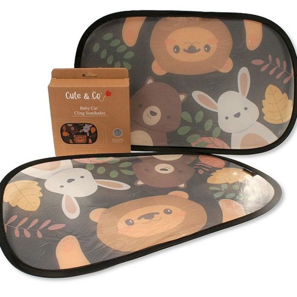 A child's car sunshade with animals printed on it 