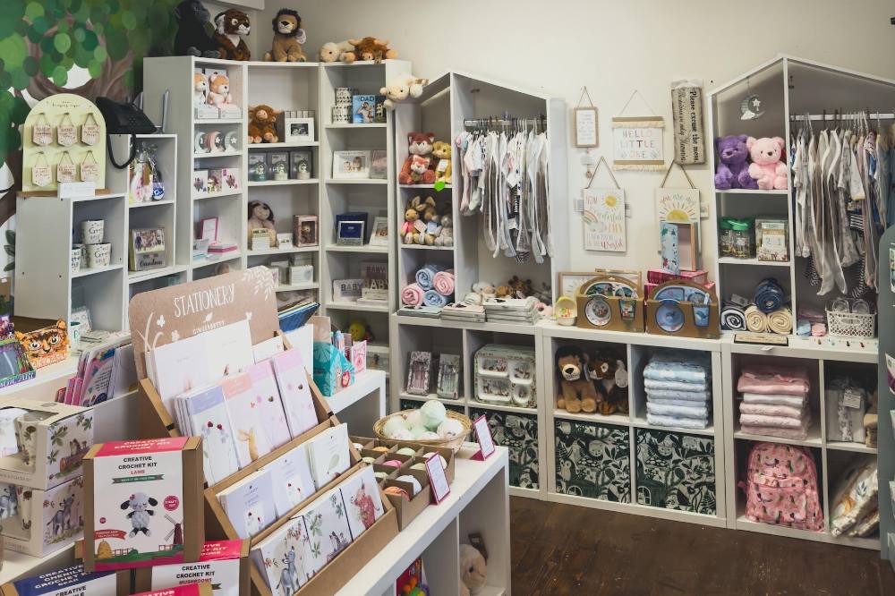 Children's toys, clothes and gifts displayed in the Little Acorn Gifts store