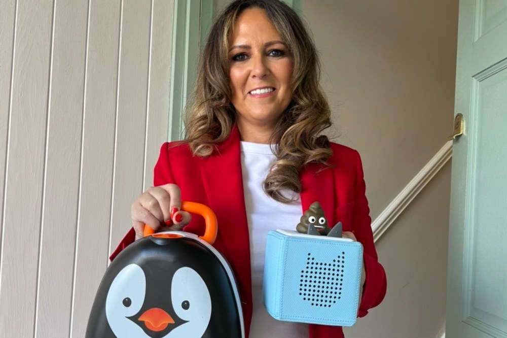 My Carry Potty's Amanda Jenner holding the new potty training Tonie