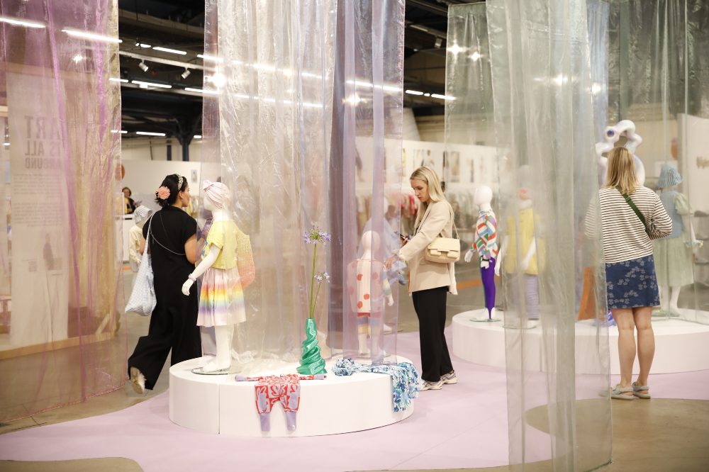 People looking a trend display at Playtime Paris 