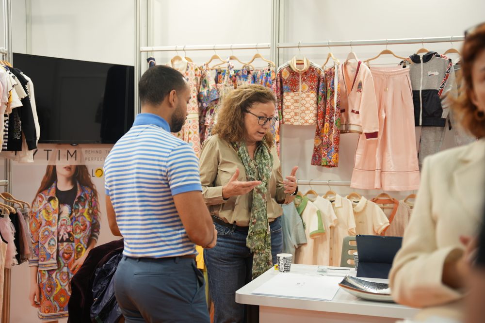 People on a kidswear exhibition stand at IFCO Istanbul Fashion Connection