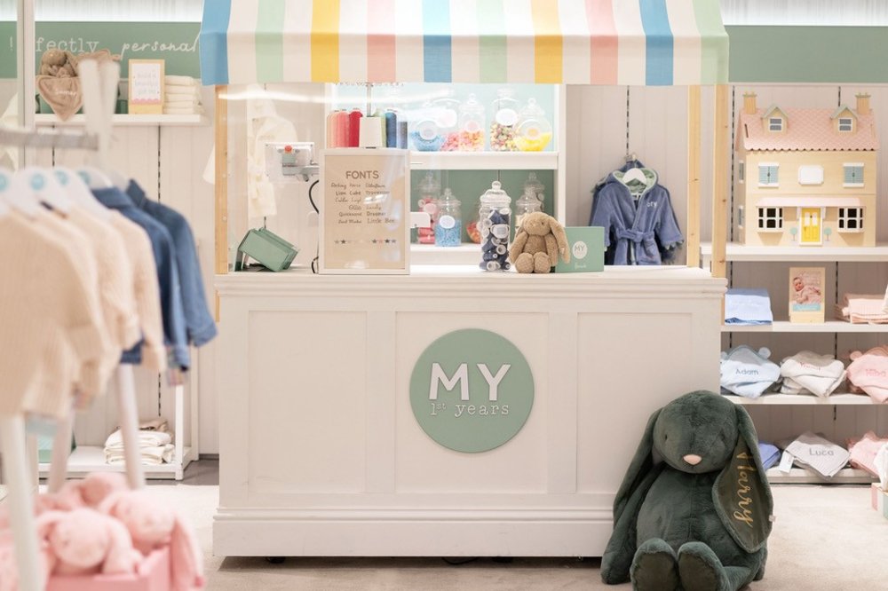 Children's personalised clothing and gifts displayed in the new My 1st Years concession in Harrods