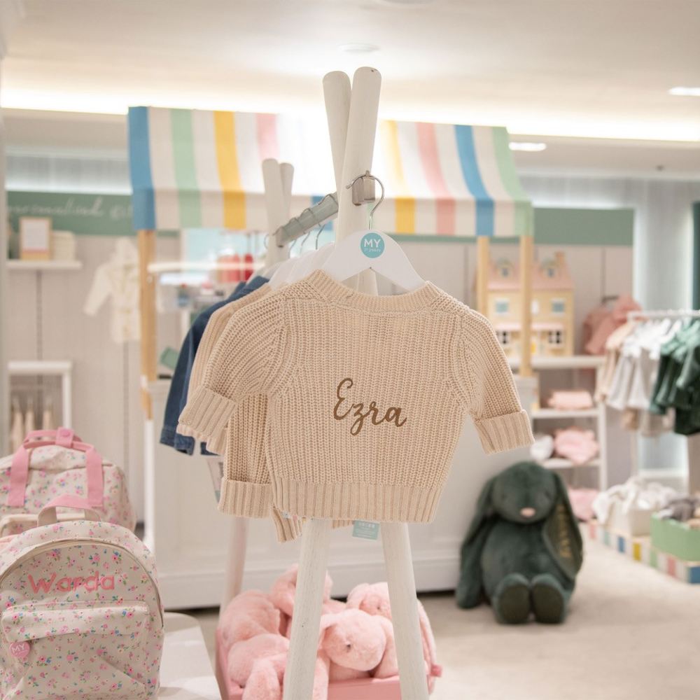 Children's clothing and gifts displayed in the new My 1st Years concession in Harrods