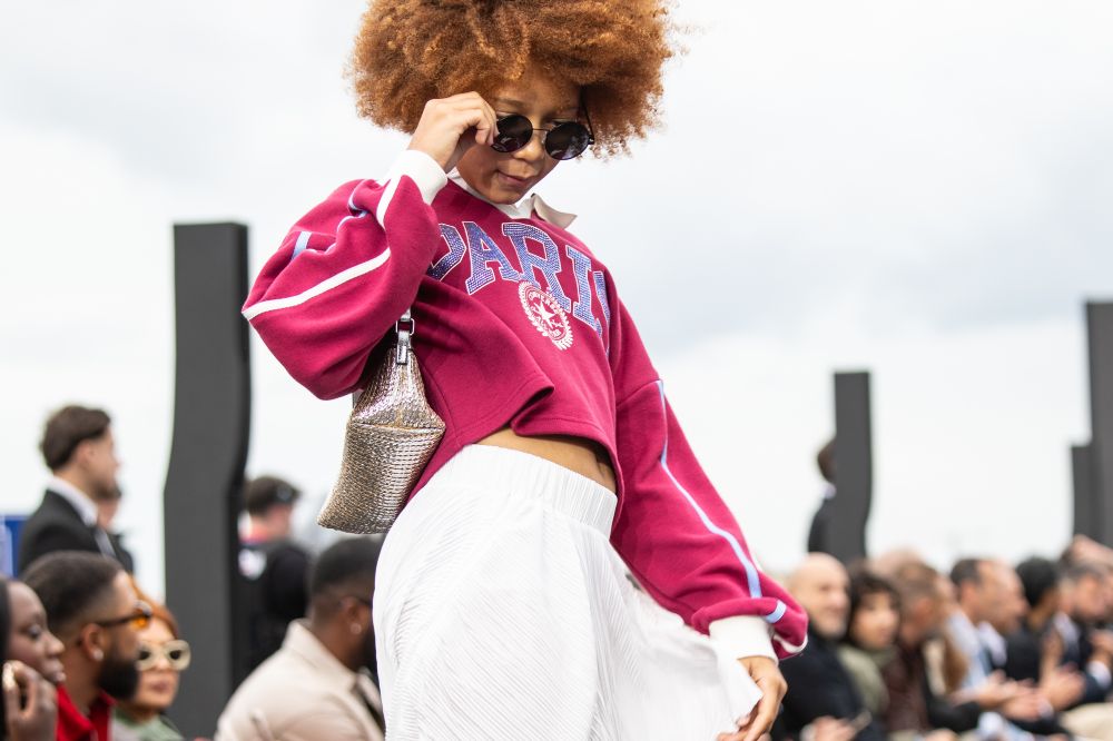 A girl stood on a catwalk at the Rookie Kids fashion show