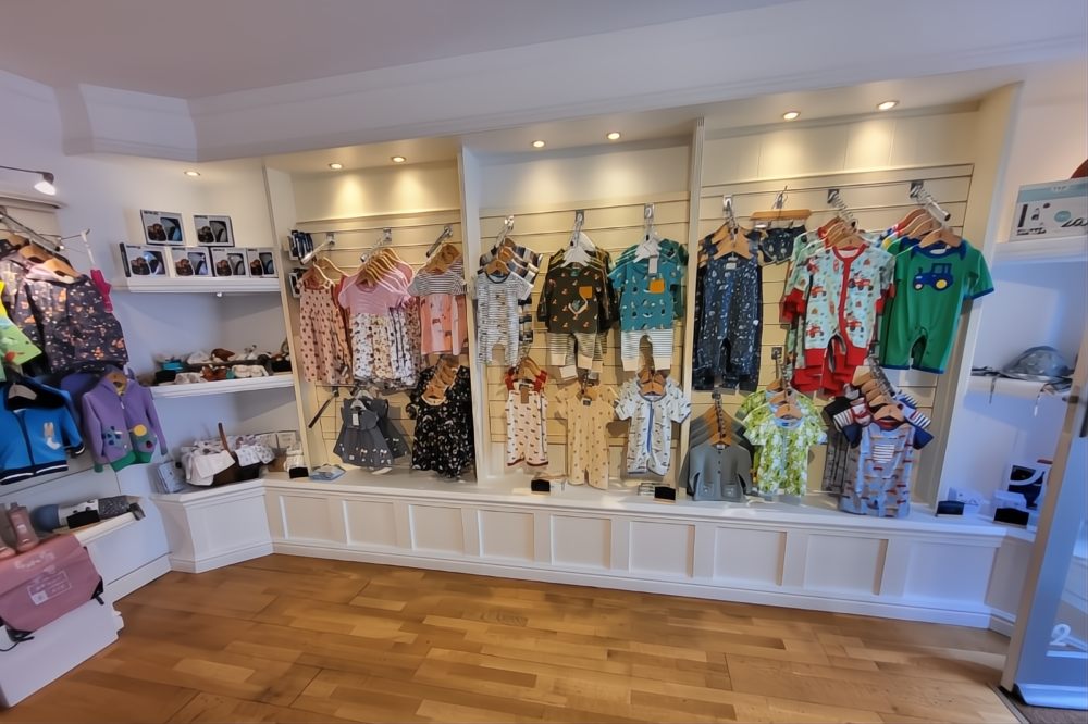 Children's clothes displayed in the Seedlings Baby store
