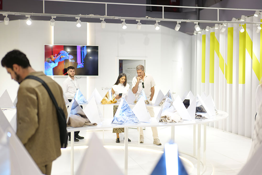 Vistors stood on a exhibition stand at Texhibition Istanbul