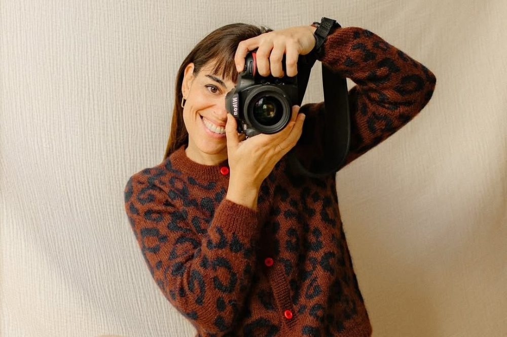 Playtime ambassador Claudia Cabero holding a camera