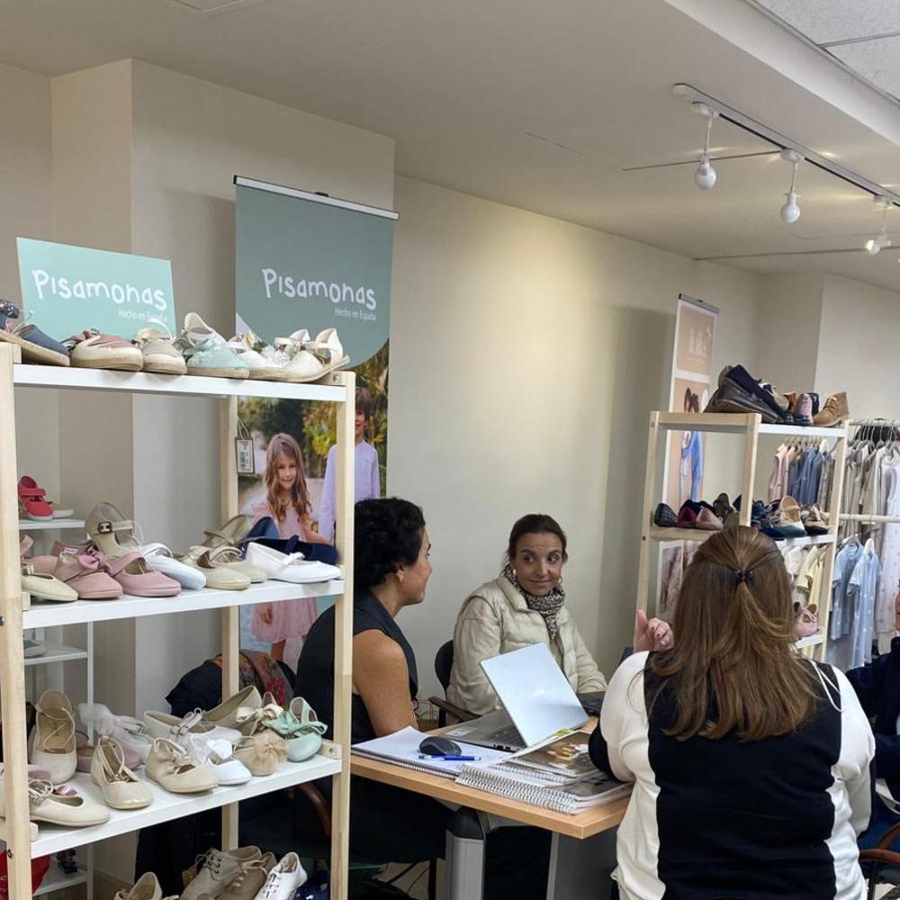 People on a children's footwear stand at the ASEPRI showroom in Mexico City 