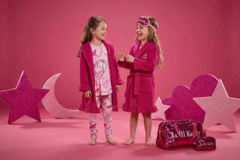 Two girls in pink sleepwear and dressing gowns by Lelli Kelly Clothing 