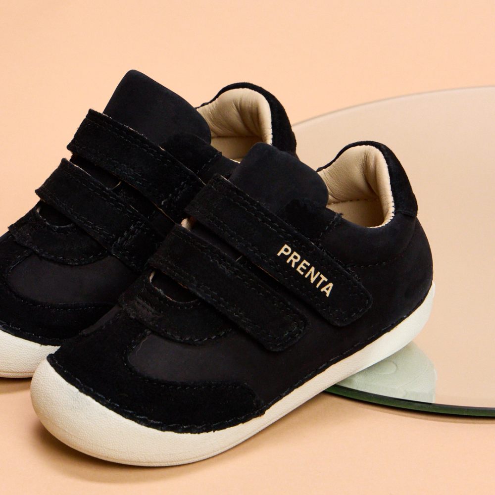A pair of children's navy trainers by PRENTA 