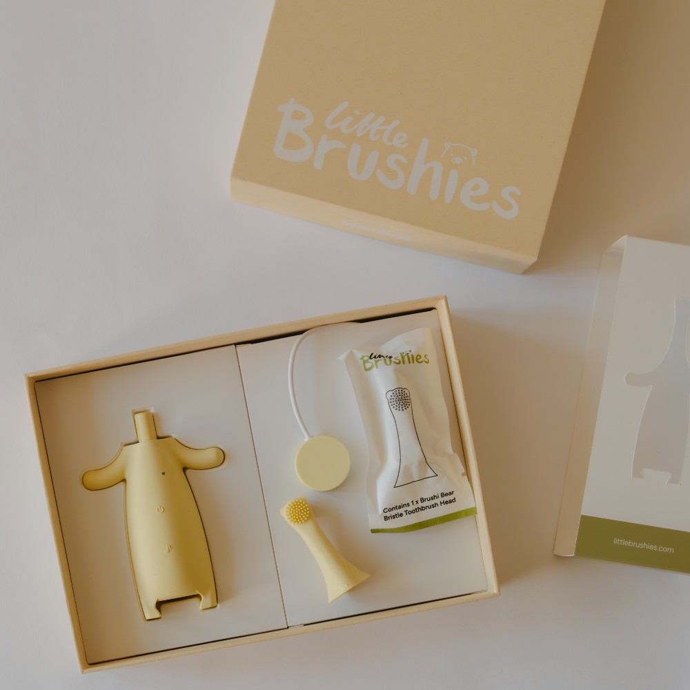 A Brushie Bear tooth brush displayed with its packaging 