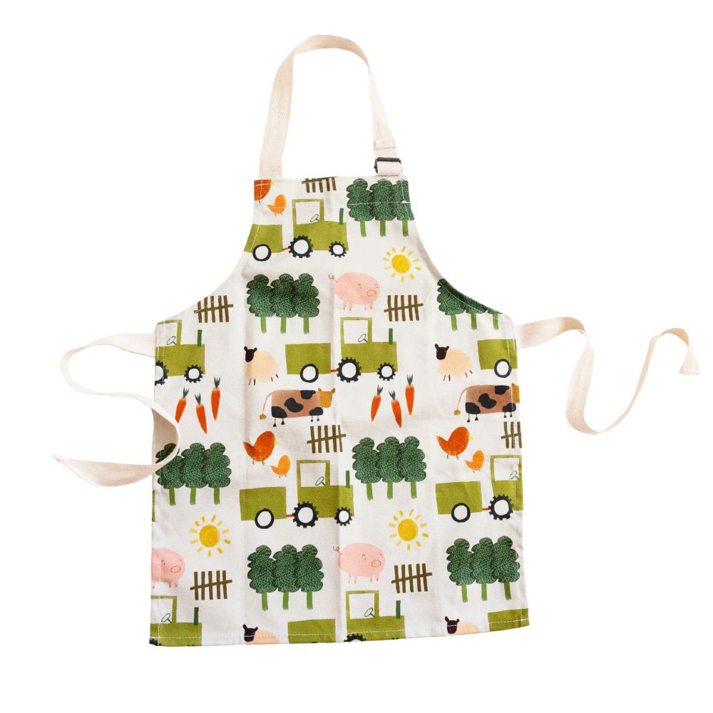 A children's apron with a farm print 