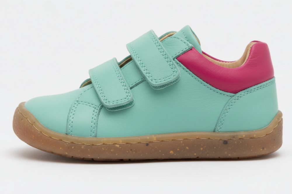 A child's turquoise and pink shoe by TT kids