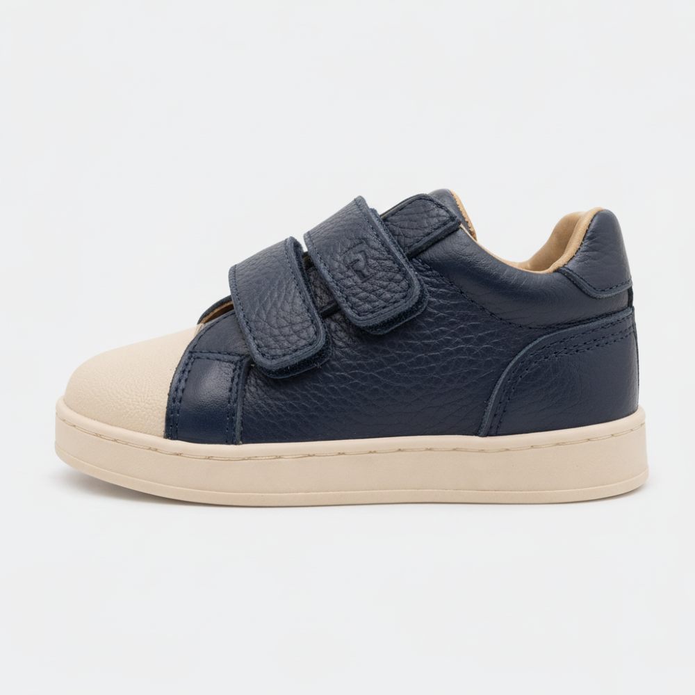 A child's navy shoe by TT Kids 
