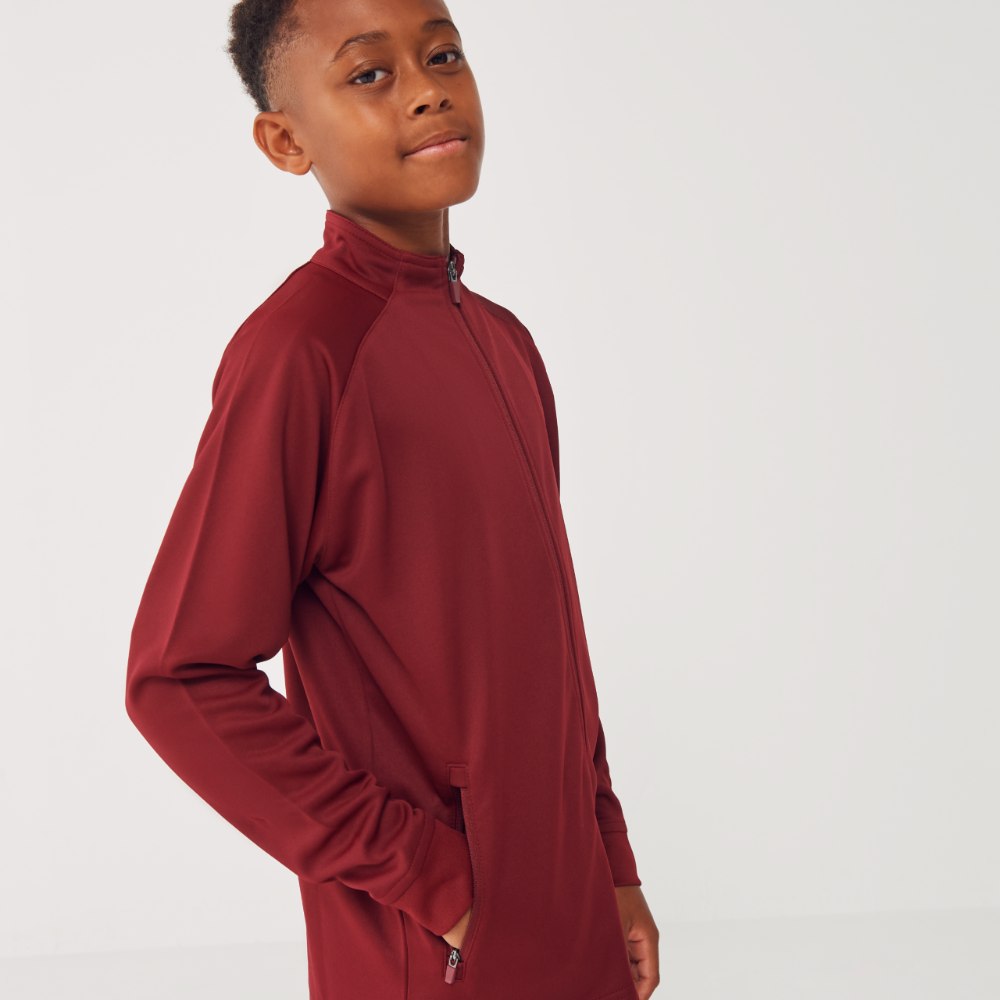 A child in a maroon tracksuit by Finden and Hales