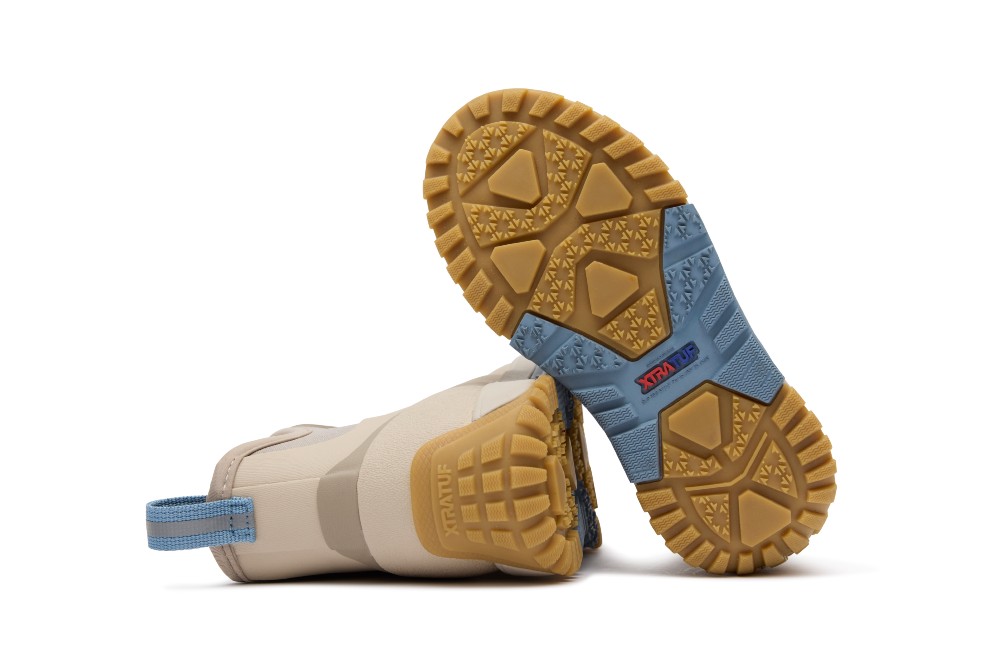 A stone and blue coloured pair of waterproof children's boots by XTRATUF