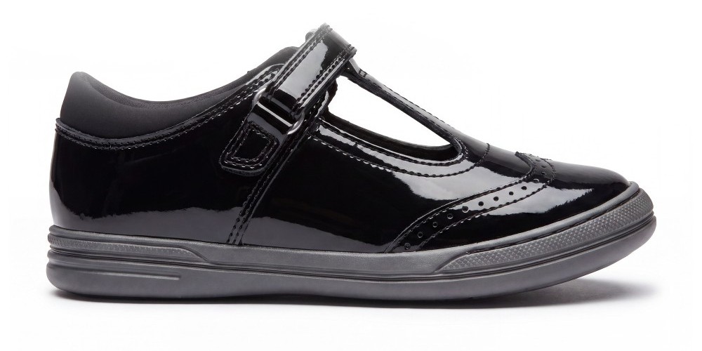 A black patent school shoe by Term Footwear shown against a white background 