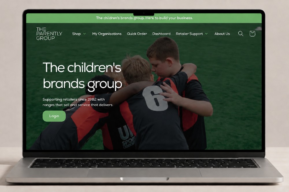 An open laptop showing The Parently Group trade portal