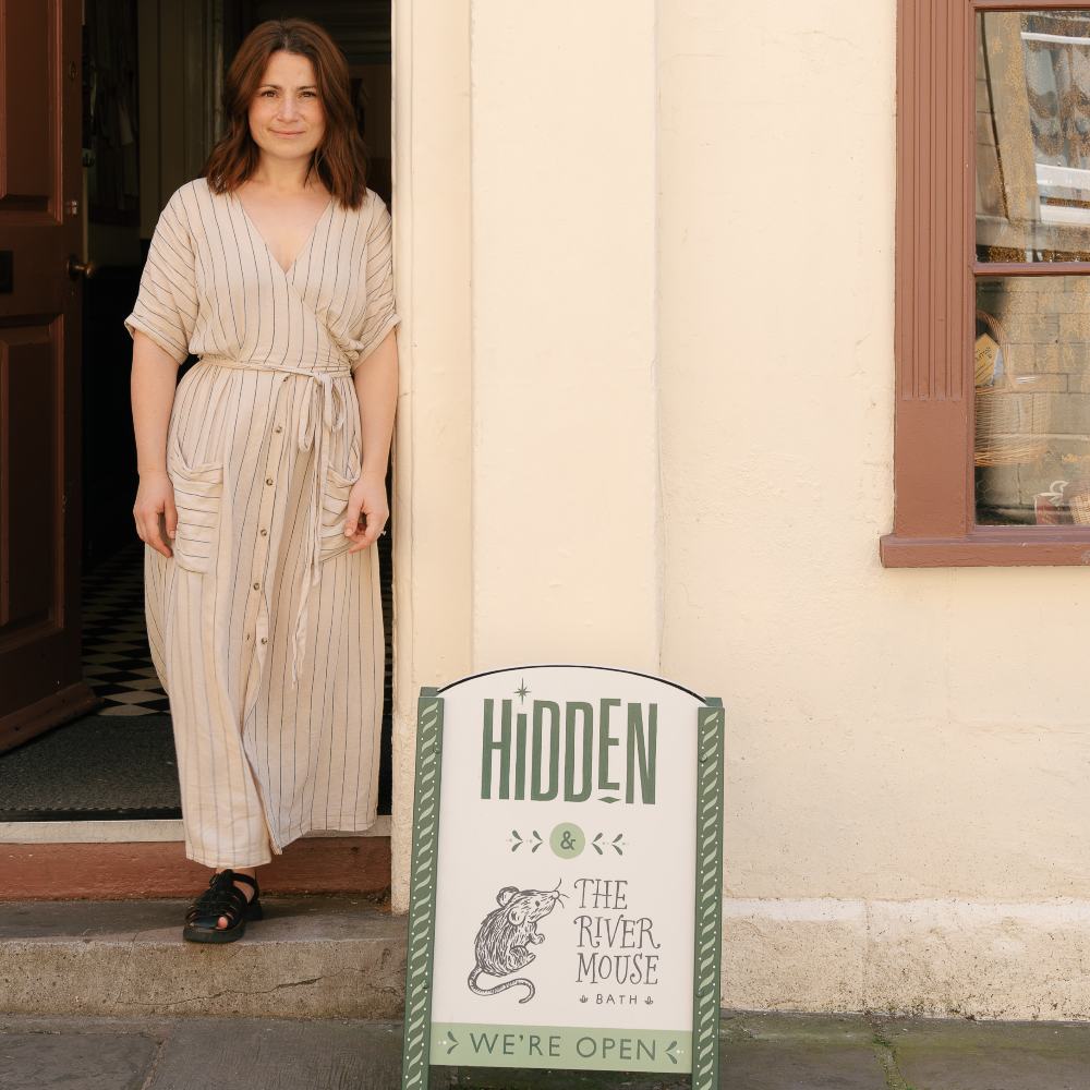 The owner of The River Mouse children's store stood outside the front of the shop