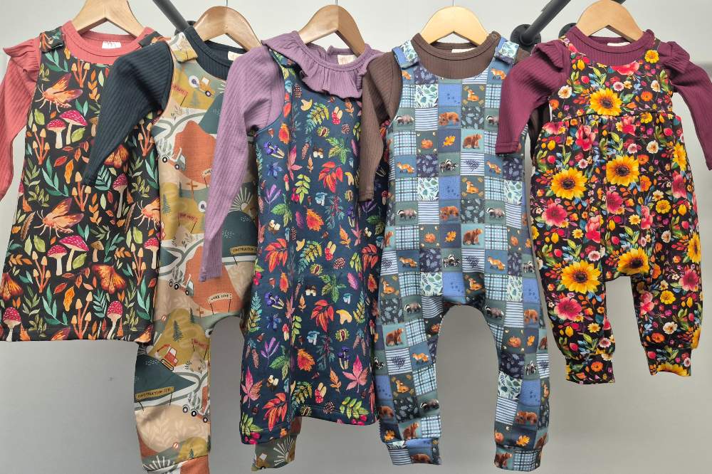 A rail of children's clothes by Boannie Riggit