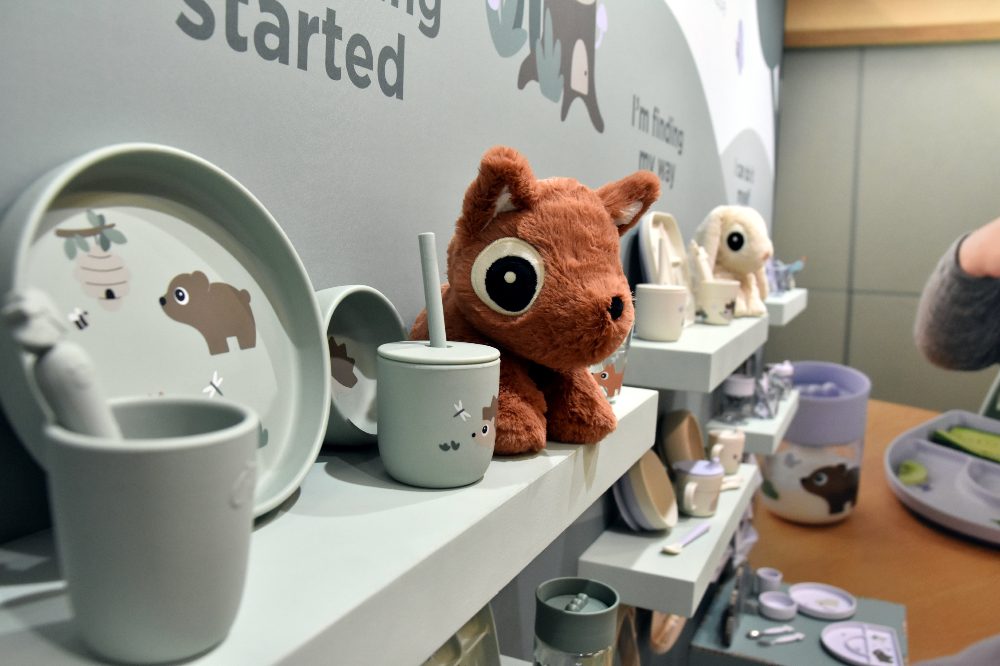 Baby and children's nursery products displayed on a stand at Harrogate Nursery Fair