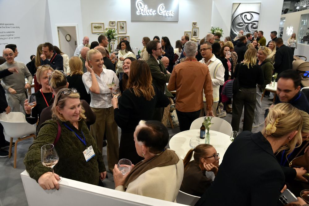 People socialising on an exhibition stand at Harrogate Nursery Fair