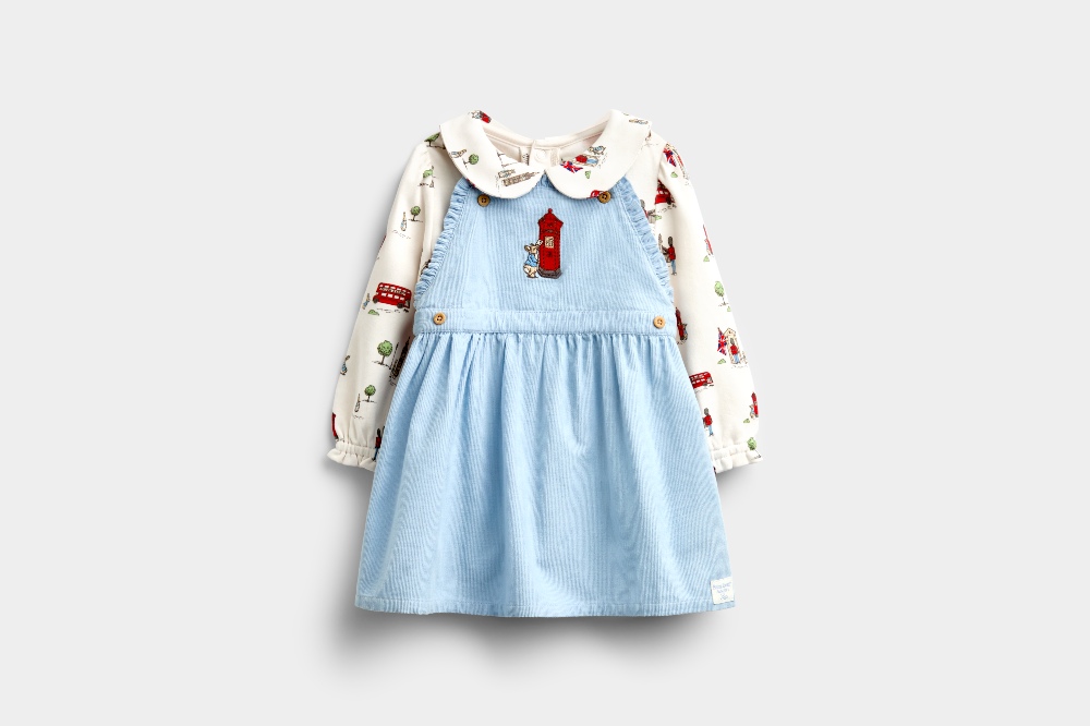 A child's blue dress an top featuring Peter Rabbit and London icons