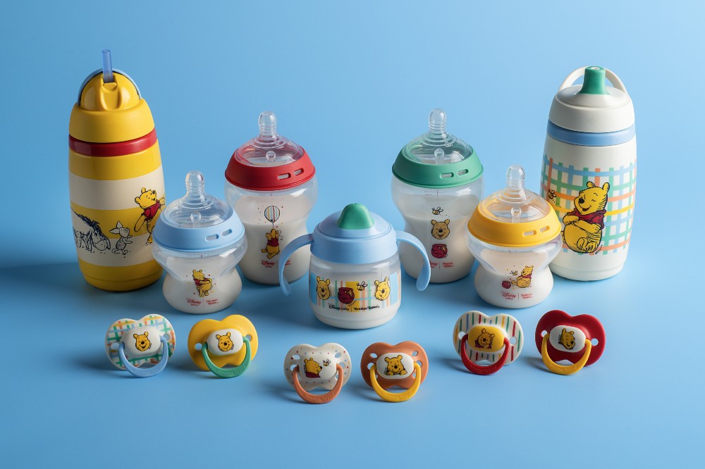 A display of baby bottles and soothers from the Tommee Tippee x Disney Baby Winnie the Pooh collaboration